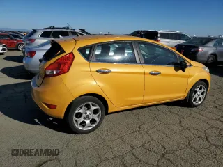 2011 Ford Fiesta SES with VIN 3FADP4FJ6BM124655, listed as a Copart auction lot 42670165 with 112,008 mi miles and Salvage Title. Bid and sale history available at carsss.com. Image 3.