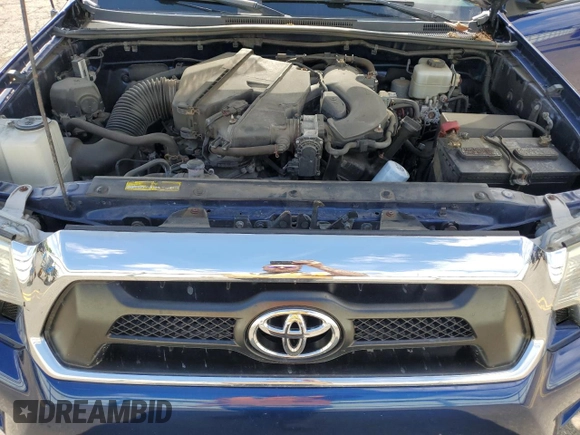 2015 Toyota Tacoma z VIN 3TMLU4EN7FM167507, wystawiony jako Copart lot #55957635 z przebiegiem 91 374 mil mil oraz Szkoda całkowita • Salvage title. Historia ofert i sprzedaży dostępna na DreamBid. Obrazek 11.