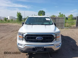 2021 Ford F-150 XL with VIN 1FTFX1E84MKE55115, listed as a IAAI auction lot 42081695 with 115,219 mi miles and . Bid and sale history available at DreamBid. Image 6.