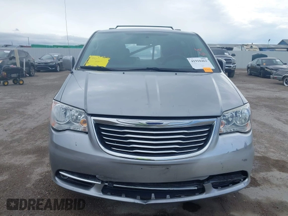 2016 Chrysler Town & Country Touring with VIN 2C4RC1BG0GR213058, listed as a IAAI auction lot 41910462 with 125,013 mi miles and . Bid and sale history available at DreamBid. Image 12.