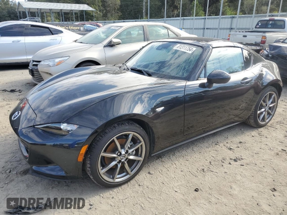 2022 Mazda MX-5 Miata Grand Touring z VIN JM1NDAM78N0507632, wystawiony jako Copart lot #81311754 z przebiegiem 4 720 mil mil oraz Szkoda całkowita • Salvage title. Historia ofert i sprzedaży dostępna na DreamBid. Obrazek 1.