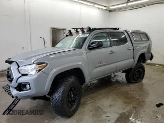 2021 Toyota Tacoma SR with VIN 3TMCZ5AN0MM400752, listed as a Copart auction lot 51308015 with 68,959 mi miles and Salvage title. Bid and sale history available at DreamBid. Image 1.