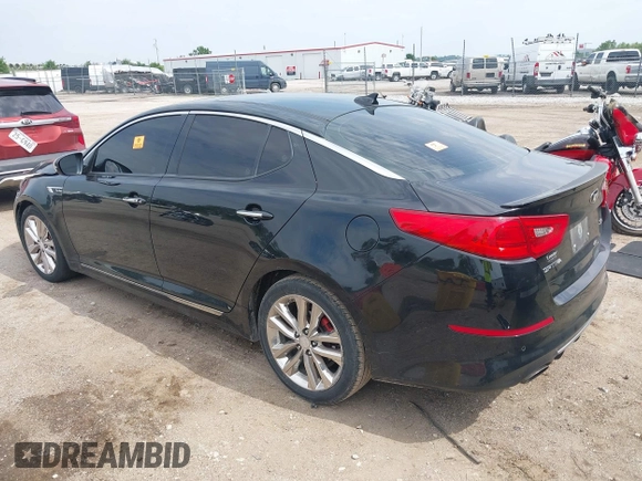 2014 Kia Optima SX Turbo with VIN 5XXGR4A65EG276131, listed as a IAAI auction lot 42429004 with 136,766 mi miles and . Bid and sale history available at DreamBid. Image 3.