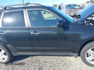 2010 Subaru Forester 2.5X Premium with VIN JF2SH6CC2AH730085, listed as a IAAI auction lot 42052868 with 140,447 mi miles. Bid and sale history available at carsss.com. Image 6.