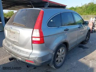 2008 Honda CR-V EX with VIN 3CZRE38588G704135, listed as a IAAI auction lot 42003299 with 269,392 mi miles. Bid and sale history available at carsss.com. Image 4.