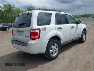 2008 Ford Escape Hybrid with VIN 1FMCU59H38KC38282, listed as a IAAI auction lot 42136889 with 233,123 mi miles. Bid and sale history available at carsss.com. Image 4.
