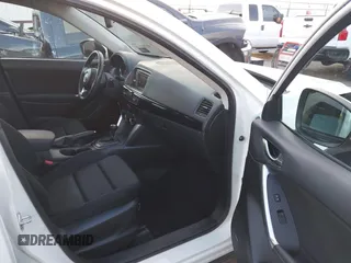 2014 Mazda CX-5 Touring with VIN JM3KE2CY8E0321578, listed as a IAAI auction lot 41769930 with 101,724 mi miles. Bid and sale history available at carsss.com. Image 5.