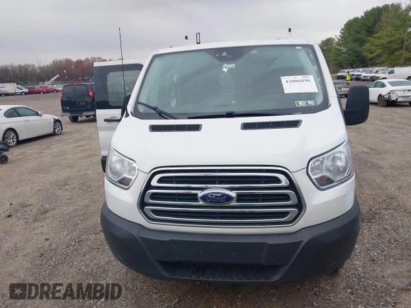 2019 Ford Transit z VIN 1FTYR1ZM4KKB00758, wystawiony jako IAAI lot #42006896 z przebiegiem 67 270 mil mil oraz . Historia ofert i sprzedaży dostępna na DreamBid. Obrazek 12.