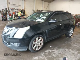2014 Cadillac SRX Performance Collection with VIN 3GYFNFE39ES659013, listed as a IAAI auction lot 42264069 with 129,122 mi miles and . Bid and sale history available at DreamBid. Image 20.