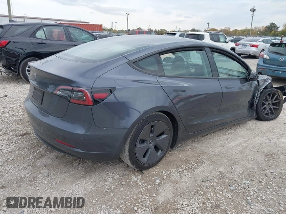 2023 Tesla Model 3 z VIN 5YJ3E1EA3PF699724, wystawiony jako IAAI lot #40654814 z przebiegiem Nie podano mil oraz . Historia ofert i sprzedaży dostępna na DreamBid. Obrazek 4.