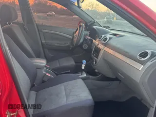 2007 Suzuki Reno z VIN KL5JD66Z77K526762, wystawiony jako Copart lot #86911034 z przebiegiem 108 090 mil mil oraz Tytuł czysty. Historia ofert i sprzedaży dostępna na DreamBid. Obrazek 5.