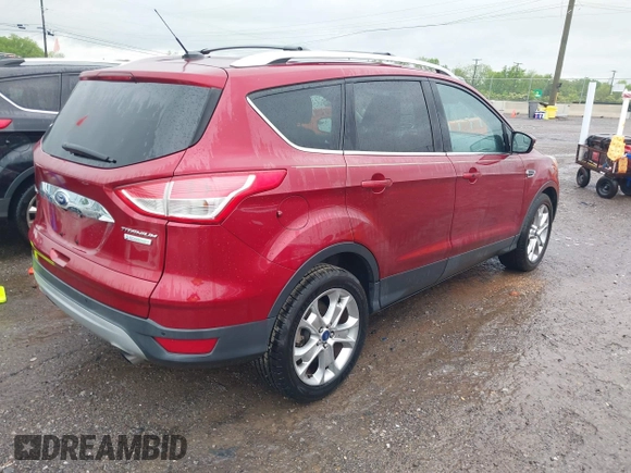 2014 Ford Escape Titanium with VIN 1FMCU0JX3EUD98815, listed as a IAAI auction lot 42078367 with 124,680 mi miles. Bid and sale history available at carsss.com. Image 4.
