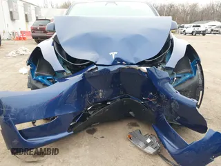 2025 Tesla Model Y Long Range with VIN 7SAYGDED9SF248370, listed as a IAAI auction lot 41336869 with 2,499 mi miles and . Bid and sale history available at DreamBid. Image 6.
