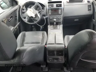 2014 Mazda CX-9 Touring with VIN JM3TB2CA7E0444918, listed as a Copart auction lot 57801165 with 116,638 mi miles and Salvage title. Bid and sale history available at DreamBid. Image 8.