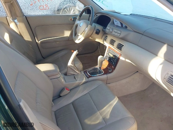 2002 Mazda Millenia with VIN JM1TA221821722812, listed as a IAAI auction lot 41405990 with NaN miles. Bid and sale history available at carsss.com. Image 5.