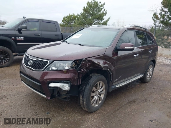 2013 Kia Sorento SX with VIN 5XYKWDA20DG370685, listed as a IAAI auction lot 42084027 with 1 mi miles. Bid and sale history available at carsss.com. Image 2.