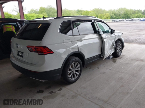 2020 Volkswagen Tiguan S z VIN 3VV1B7AX1LM110352, wystawiony jako IAAI lot #42224581 z przebiegiem 60 597 mil mil oraz . Historia ofert i sprzedaży dostępna na DreamBid. Obrazek 4.