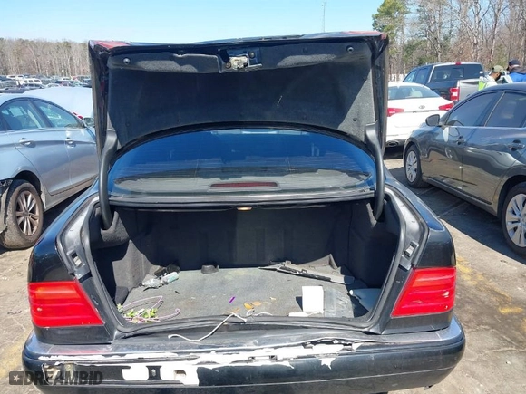 1999 Mercedes-Benz E-Class with VIN WDBJF65H3XA793706, listed as a IAAI auction lot 41650186 with 364,228 mi miles. Bid and sale history available at carsss.com. Image 16.