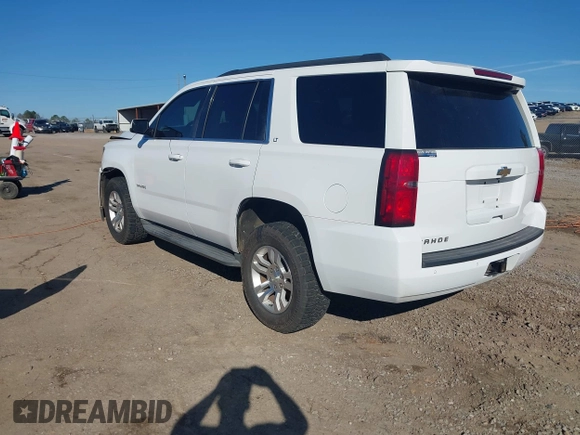 2015 Chevrolet Tahoe LT with VIN 1GNSCBKC0FR104096, listed as a IAAI auction lot 41679298 with 231,005 mi miles and . Bid and sale history available at DreamBid. Image 3.