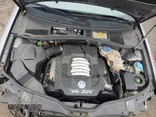 2003 Volkswagen Passat GLX z VIN WVWRH63B73P271889, wystawiony jako Copart lot #57166465 z przebiegiem 56 457 mil mil oraz Szkoda całkowita • Salvage title. Historia ofert i sprzedaży dostępna na DreamBid. Obrazek 11.
