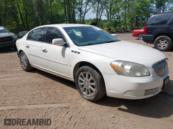 2009 Buick Lucerne CXL with VIN 1G4HD57M79U135698, listed as a IAAI auction lot 42165966 with 131,615 mi miles. Bid and sale history available at carsss.com. Image 1.