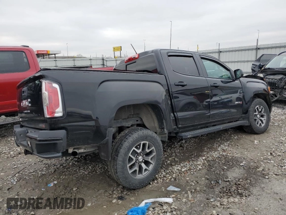 2022 GMC Canyon 4WD AT4 w/Cloth with VIN 1GTG6FENXN1105280, listed as a Copart auction lot 44232685 with 44,265 mi miles and Salvage Title. Bid and sale history available at carsss.com. Image 3.