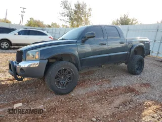2005 Dodge Dakota SLT z VIN 1D7HW48K45S139614, wystawiony jako Copart lot #83898134 z przebiegiem 200 188 mil mil oraz Szkoda całkowita • Salvage title. Historia ofert i sprzedaży dostępna na DreamBid. Obrazek 1.