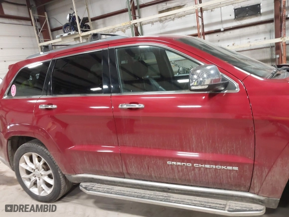 2014 Jeep Grand Cherokee Summit with VIN 1C4RJFJT4EC308729, listed as a IAAI auction lot 41694212 with 175,654 mi miles. Bid and sale history available at carsss.com. Image 13.
