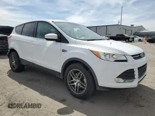 2015 Ford Escape SE with VIN 1FMCU0G76FUB95457, listed as a Copart auction lot 50342125 with 100,565 mi miles and Salvage Title. Bid and sale history available at DreamBid. Image 4.