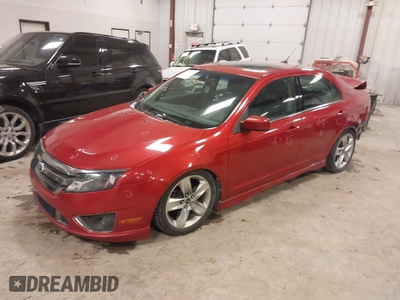 2011 Ford Fusion SPORT with VIN 3FAHP0DC5BR119884, listed as a IAAI auction lot 41534405 with 170,437 mi miles. Bid and sale history available at carsss.com. Image 2.