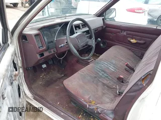 1991 Nissan Frontier z VIN 1N6SD11S2MC319260, wystawiony jako IAAI lot #42043382 z przebiegiem Nie podano mil oraz . Historia ofert i sprzedaży dostępna na DreamBid. Obrazek 5.