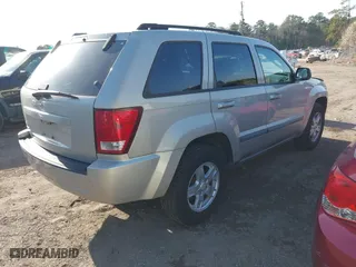 2007 Jeep Grand Cherokee Laredo with VIN 1J8GS48K17C516150, listed as a IAAI auction lot 41752720 with 176,114 mi miles. Bid and sale history available at carsss.com. Image 4.