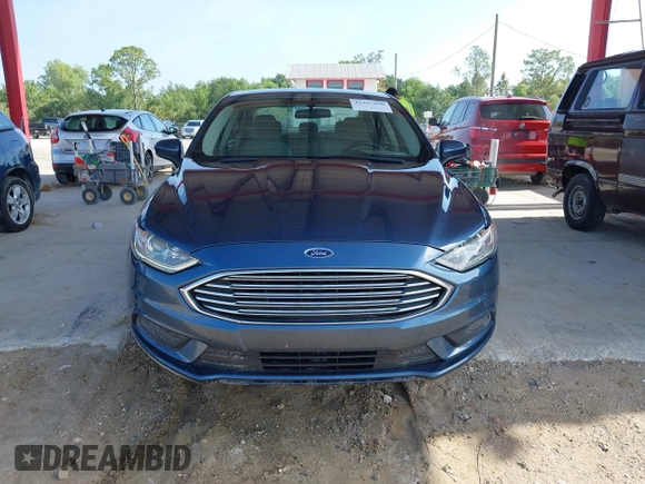 2018 Ford Fusion SE z VIN 3FA6P0HD8JR201052, wystawiony jako IAAI lot #42367050 z przebiegiem 90 502 mil mil oraz . Historia ofert i sprzedaży dostępna na DreamBid. Obrazek 12.