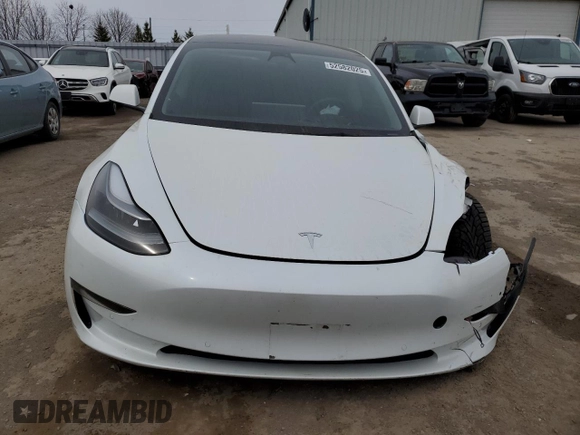 2022 Tesla Model 3 Long Range with VIN 5YJ3E1EB3NF353131, listed as a Copart auction lot 52582025 with 68,745 mi miles and Salvage Title. Bid and sale history available at carsss.com. Image 5.