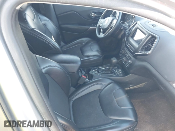 2019 Jeep Cherokee Latitude Plus with VIN 1C4PJLLB5KD403431, listed as a IAAI auction lot 42127918 with 94,360 mi miles and . Bid and sale history available at DreamBid. Image 5.