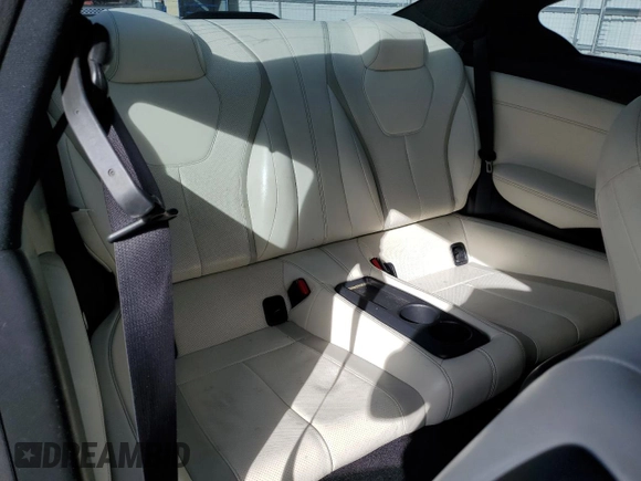 2017 Infiniti Q60 Red Sport 400 with VIN JN1FV7EL3HM701520, listed as a Copart auction lot 57169565 with 103,761 mi miles and Salvage title. Bid and sale history available at DreamBid. Image 10.