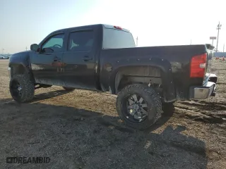 2012 Chevrolet Silverado 1500 LT with VIN 1GCPKSE72CF196471, listed as a Copart auction lot 62027004 with 149,218 mi miles and Salvage Title. Bid and sale history available at carsss.com. Image 2.