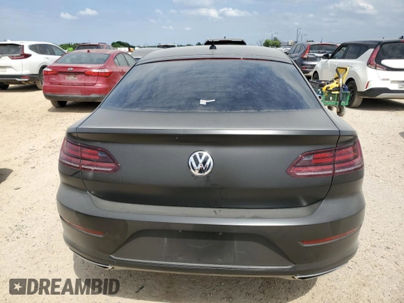 2020 Volkswagen Arteon SE z VIN WVWAR7AN7LE013526, wystawiony jako Copart lot #52791425 z przebiegiem 28 480 mil mil oraz Czysty tytuł • Clean title. Historia ofert i sprzedaży dostępna na DreamBid. Obrazek 6.