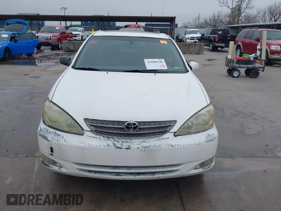 2003 Toyota Camry LE z VIN JTDBF30K530148403, wystawiony jako IAAI lot #41688346 z przebiegiem 299 143 mil mil oraz . Historia ofert i sprzedaży dostępna na DreamBid. Obrazek 12.