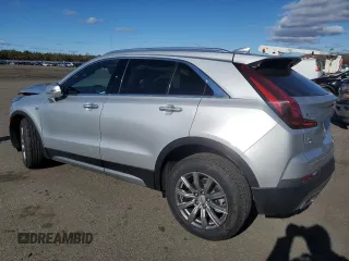2022 Cadillac XT4 AWD Premium Luxury with VIN 1GYFZDR42NF100239, listed as a Copart auction lot 80175144 with 48,088 mi miles and Salvage Title. Bid and sale history available at carsss.com. Image 2.