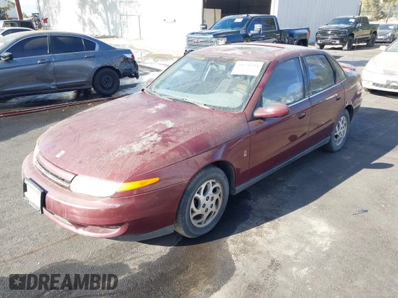 2002 Saturn LS z VIN 1G8JU54F72Y519923, wystawiony jako IAAI lot #40676524 z przebiegiem Nie podano mil oraz . Historia ofert i sprzedaży dostępna na DreamBid. Obrazek 2.