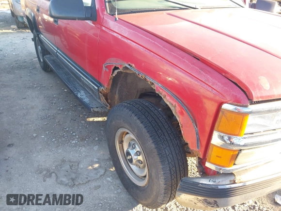 1999 Chevrolet Suburban with VIN 1GNGK26J8XJ377255, listed as a IAAI auction lot 41428307 with 250,000 mi miles. Bid and sale history available at carsss.com. Image 5.