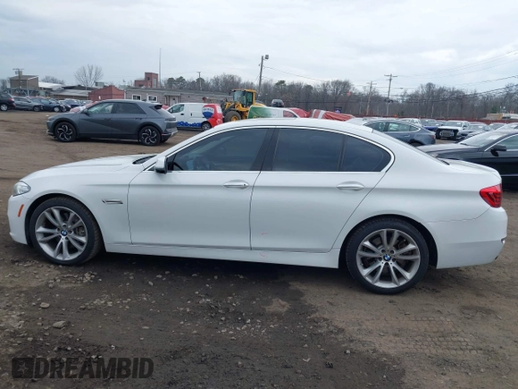 2014 BMW 5 Series 535i xDrive with VIN WBA5B3C57ED537549, listed as a IAAI auction lot 41047583 with 69,005 mi miles and . Bid and sale history available at carsss.com. Image 14.