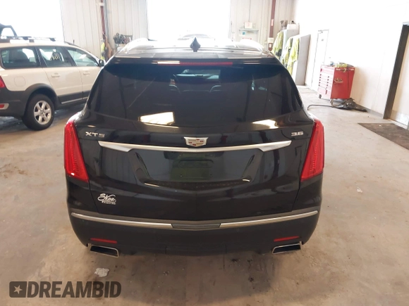 2019 Cadillac XT5 Luxury FWD z VIN 1GYKNCRS2KZ197052, wystawiony jako IAAI lot #42242466 z przebiegiem 86 678 mil mil oraz . Historia ofert i sprzedaży dostępna na DreamBid. Obrazek 16.