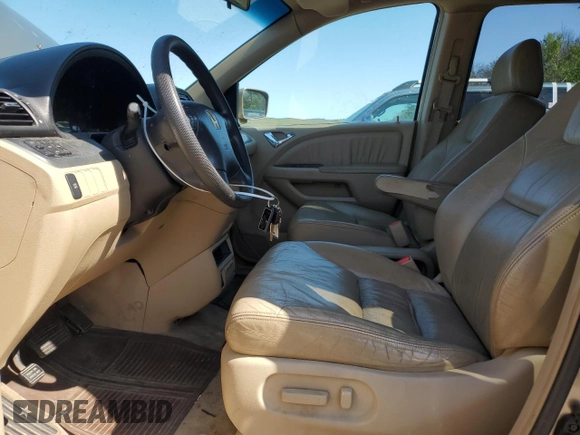 2005 Honda Odyssey EX-L with VIN 5FNRL38735B040552, listed as a Copart auction lot 57435355 with 183,768 mi miles and Salvage title. Bid and sale history available at DreamBid. Image 7.