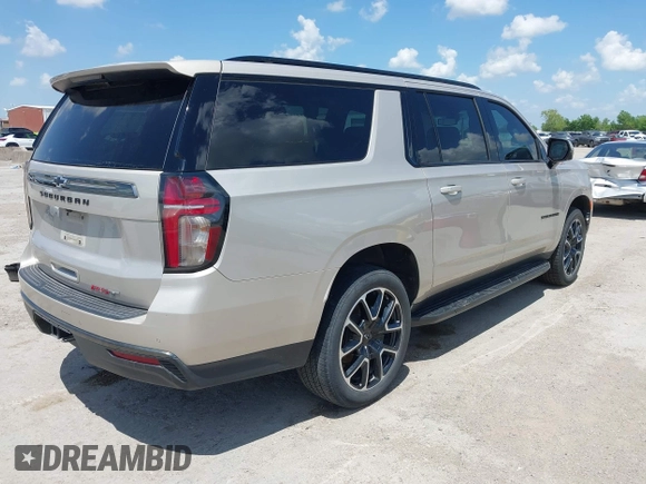 2022 Chevrolet Suburban RST with VIN 1GNSCEKD9NR230711, listed as a IAAI auction lot 42086329 with 115,792 mi miles and . Bid and sale history available at DreamBid. Image 4.