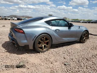 2021 Toyota Supra 3.0 z VIN WZ1DB0C02MW035473, wystawiony jako Copart lot #52582315 z przebiegiem Nie podano mil oraz Szkoda całkowita • Salvage title. Historia ofert i sprzedaży dostępna na DreamBid. Obrazek 3.