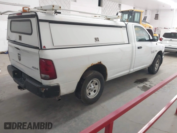 2014 Ram 1500 Tradesman z VIN 3C6JR7DT6EG285109, wystawiony jako IAAI lot #42306741 z przebiegiem 218 286 mil mil oraz . Historia ofert i sprzedaży dostępna na DreamBid. Obrazek 4.