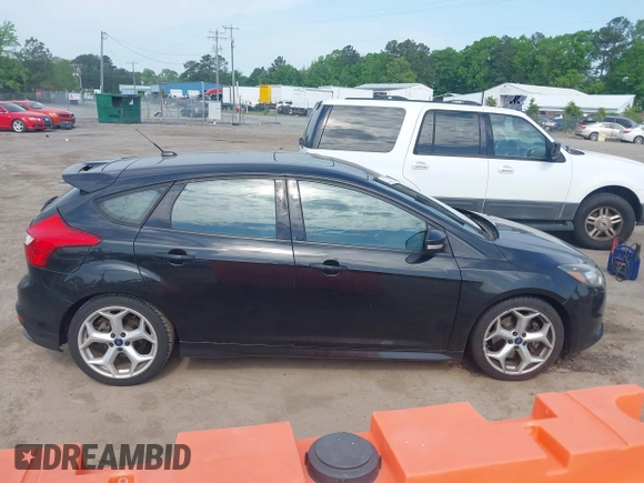 2014 Ford Focus ST with VIN 1FADP3L98EL269058, listed as a IAAI auction lot 42169021 with 106,325 mi miles and . Bid and sale history available at carsss.com. Image 13.