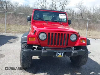 2002 Jeep Wrangler X with VIN 1J4FA39S02P739211, listed as a IAAI auction lot 41665910 with 144,118 mi miles. Bid and sale history available at carsss.com. Image 12.